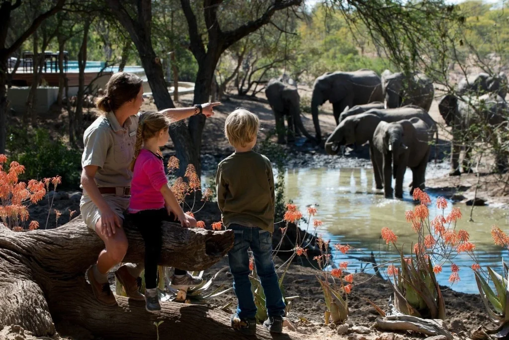 Children of different ages participating in safari activities in Tanzania